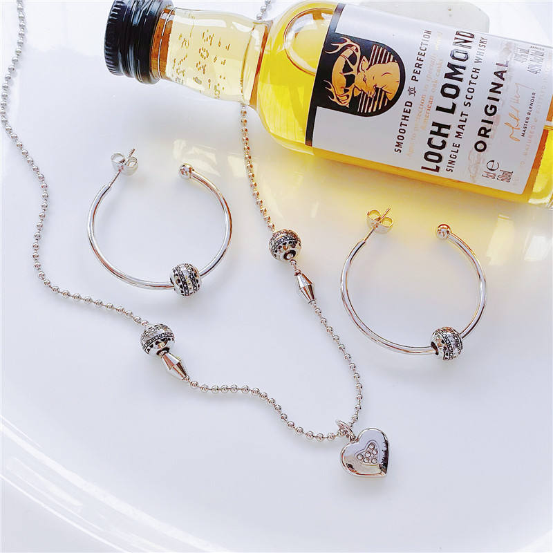 ラグジュアリーローズゴールド 316Lステンレス製 ネックレス＆ピアス ラブモチーフ 卸売