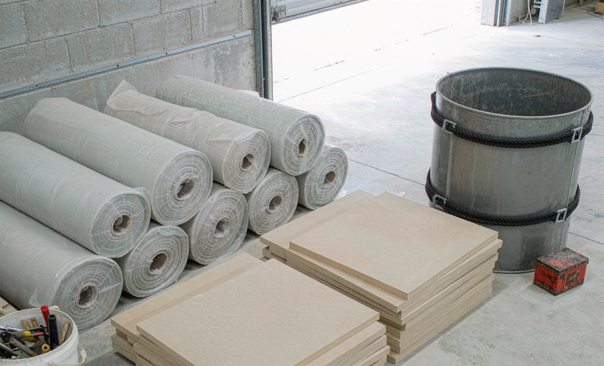 Glass fibre cloth, resin and foam blanks at the materials intake area