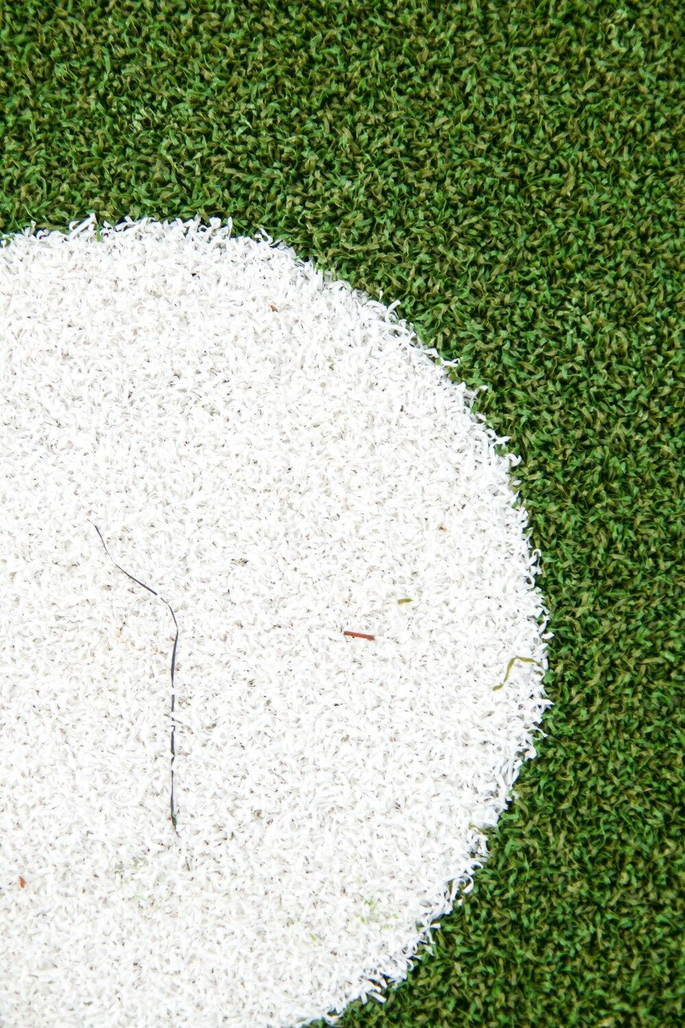 White line inlaid in synthetic turf