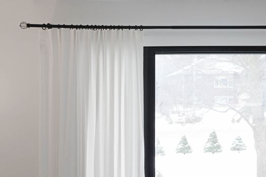 How to Hang Fabric Curtains Without Drilling